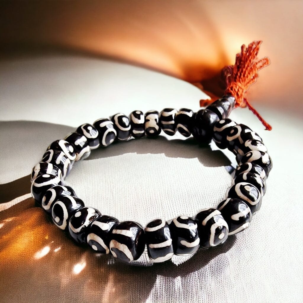 Boutique TIBET | Petit Nalanda BRACELET Elastique Pompon Rouge 10mm Bracelets Œil de Bouddha +🎁